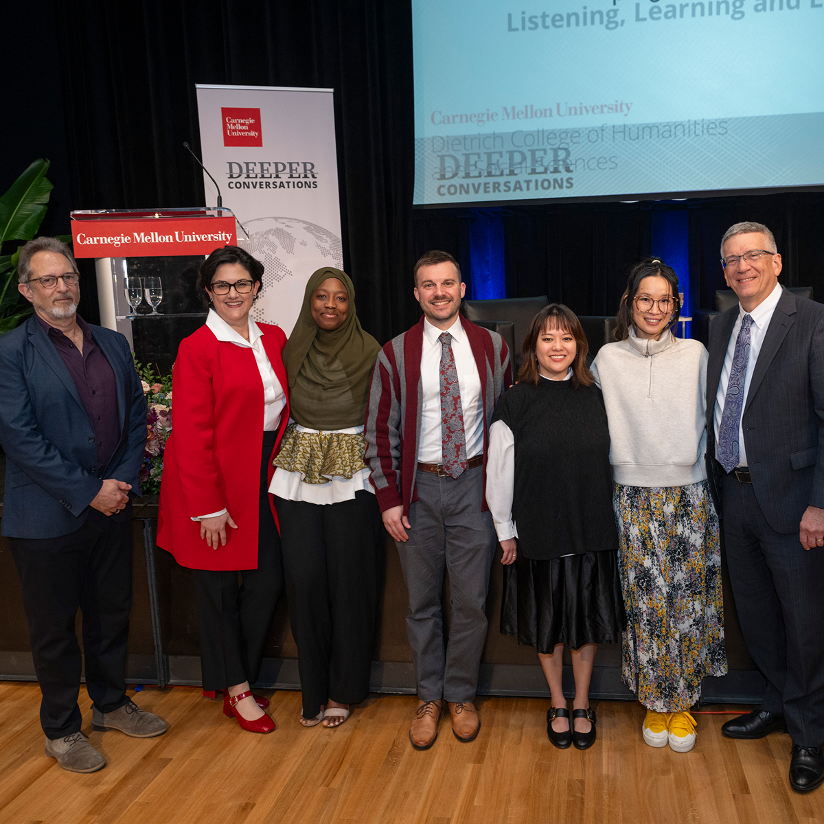 CMU alumni Tria Chang and Justine Lee with faculty after a Deeper Conversations event.