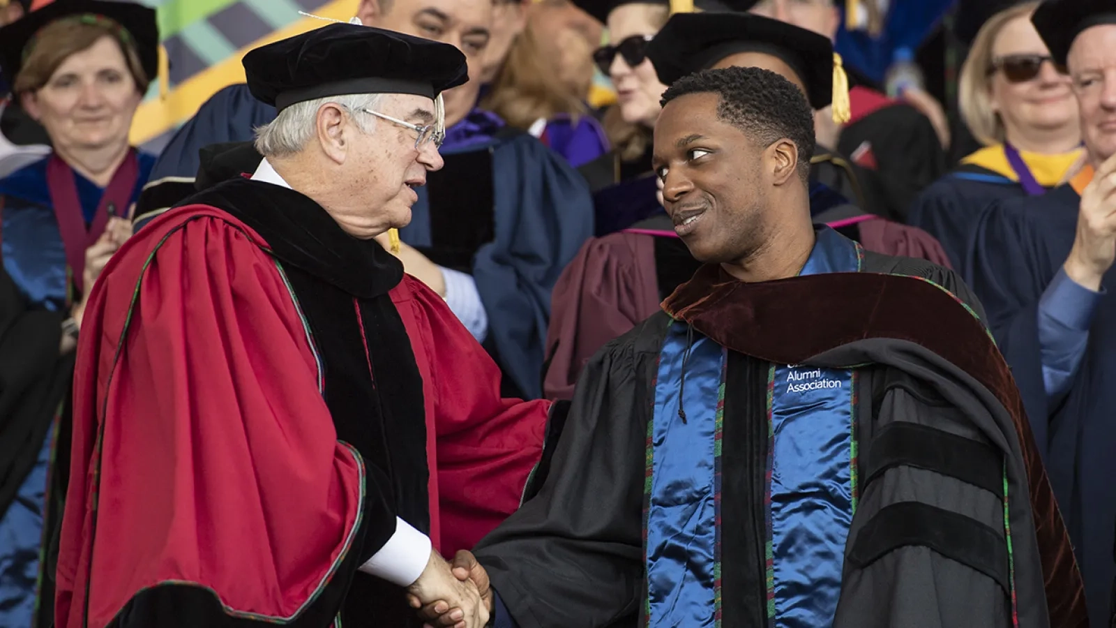 Former Board Chair Jim Rohr welcomes Leslie Odom Jr. as 2019 Commencement speaker.