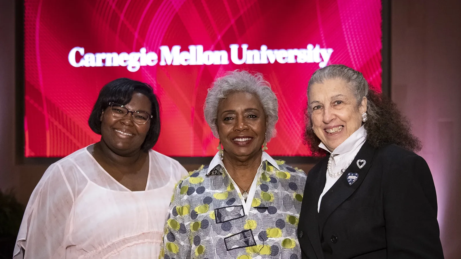 Trustee Patti Askwith Kenner greets 2019 Honorary Degree Recipient. 