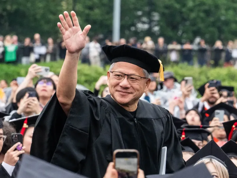 Jensen Huang walks in the procession at CMU Commencement.