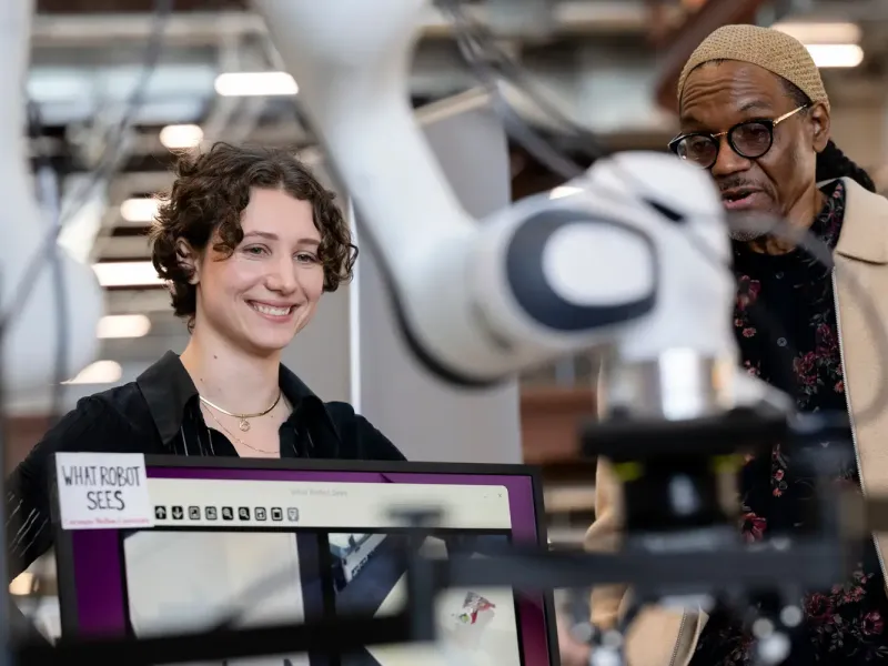 Two community members at CMU's Robotics Innovation Center.