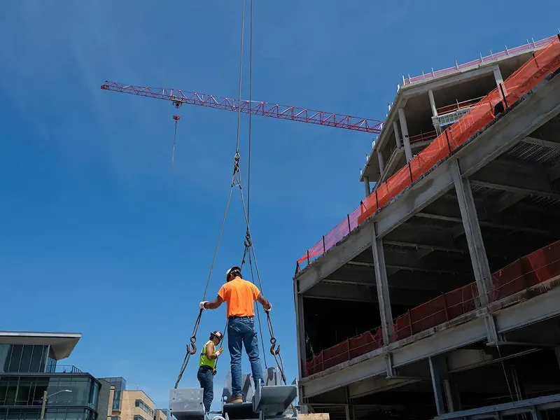 Final structural beam placed on June 8, 2026