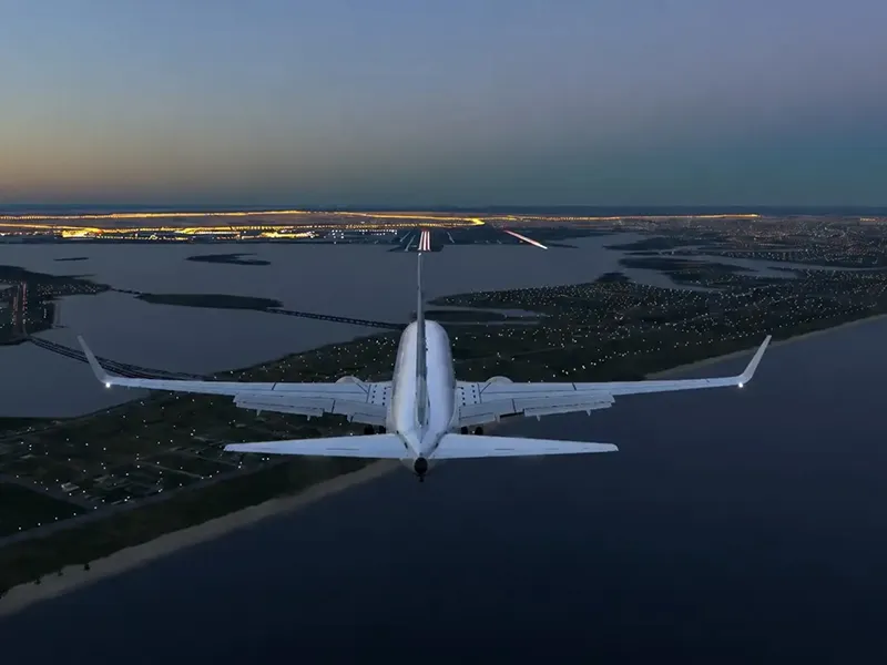 An aircraft approaches a runway in a flight simulation used to study how AI systems can detect and explain potential airport collision risks.