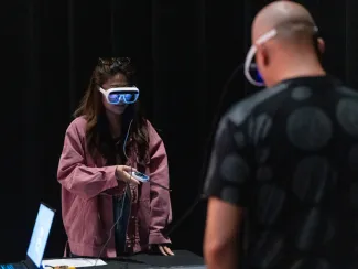 CMU students work with AI technology and virtual glasses.
